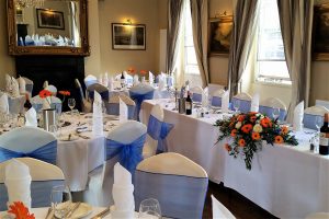 Blue and orange themed wedding reception celebration Greyhound Coaching Inn Lutterworth